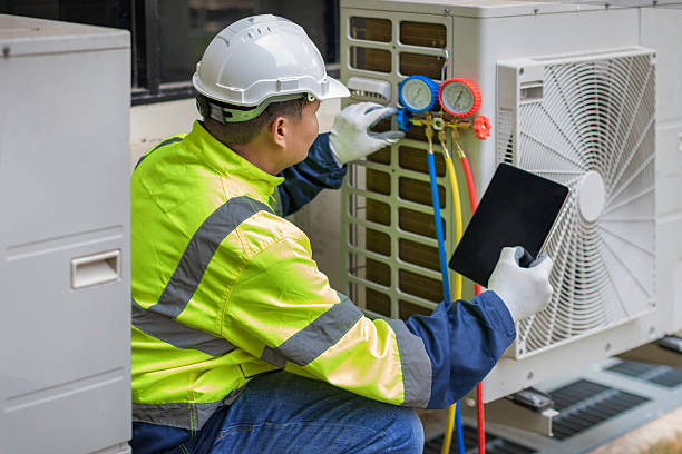 Professional Hvac technician working in Swepsonville, NC